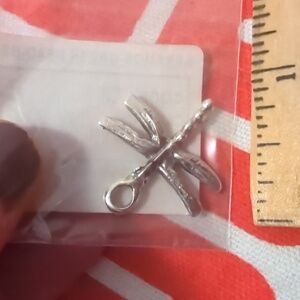Metal dragonfly charm for hand crafted artisan jewelry makers.